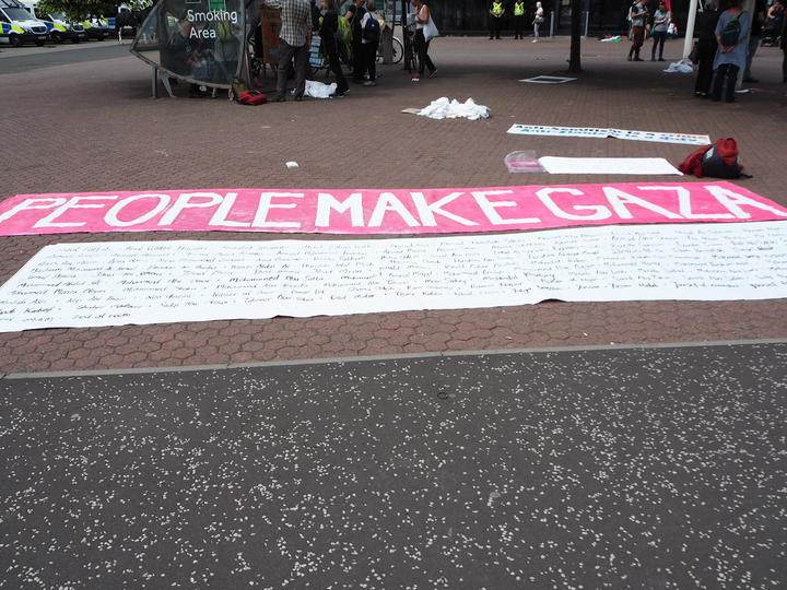 People make Gaza banner at SECC