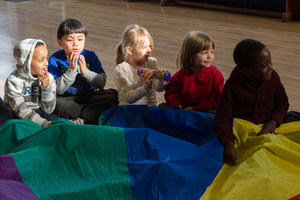 Parachutes and rainsticks: young children learn listening skills through play. Photo credit:Jane Hobson